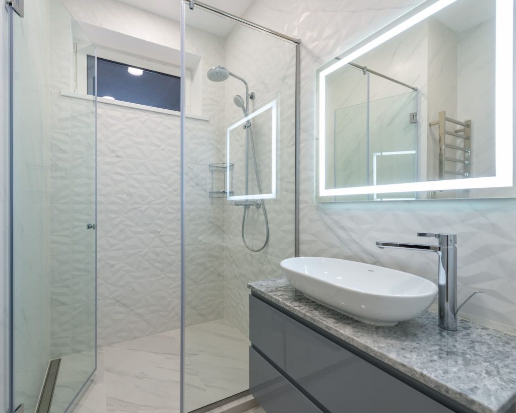 Comment démonter un mitigeur de douche sans vis ?